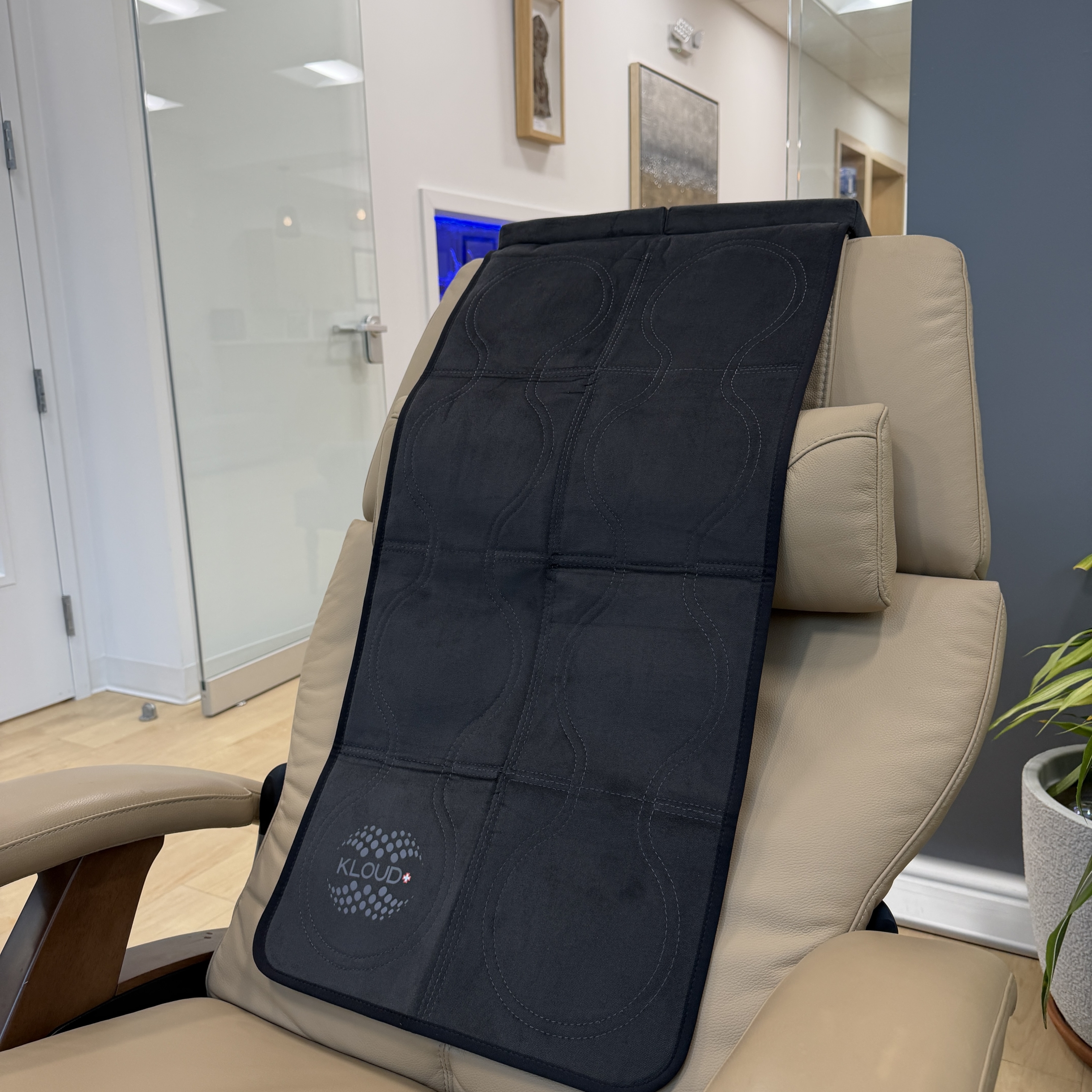 A BEMER therapy mat on a treatment chair